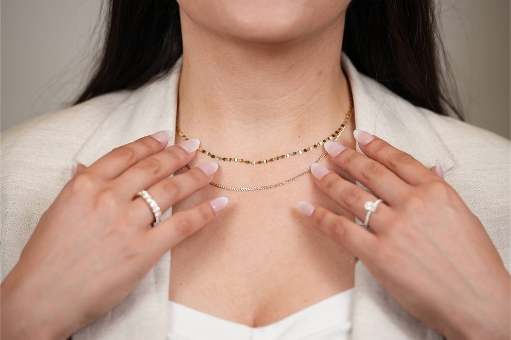 woman wearing gold jewelry